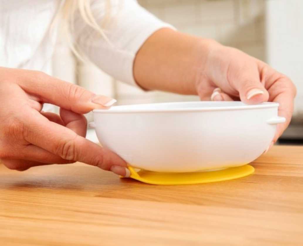 lifestyle-no-slip-suction-bowl-on-counter-pull-tab-yellow-side