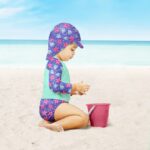BAMBINO MIO dvipusė maudymosi kepurė VIOLET